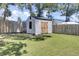 Backyard shed offering extra storage space with a fenced in backyard at 3428 Plaza Ln, North Charleston, SC 29420
