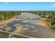 Expansive aerial shot of waterways, and neighborhood docks, offering an idyllic setting for water enthusiasts at 3508 Henrietta Hartford Rd, Mount Pleasant, SC 29466