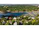 Vibrant aerial shot of residential community and waterway, showcasing docks, landscaping, and charming homes at 3508 Henrietta Hartford Rd, Mount Pleasant, SC 29466