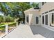 Inviting back deck offering views of the lush backyard, mature trees, and a charming bay window at 3508 Henrietta Hartford Rd, Mount Pleasant, SC 29466