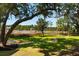 Expansive backyard with lush greenery and a scenic view of the marshland, creating a serene outdoor space at 3508 Henrietta Hartford Rd, Mount Pleasant, SC 29466