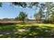 Expansive backyard with lush greenery and a scenic view of the marshland, creating a serene outdoor space at 3508 Henrietta Hartford Rd, Mount Pleasant, SC 29466