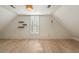 Bright, airy bedroom featuring hardwood floors and charming window shutters at 3508 Henrietta Hartford Rd, Mount Pleasant, SC 29466