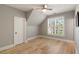 Cozy bedroom with a ceiling fan, shuttered windows, and a neutral color palette at 3508 Henrietta Hartford Rd, Mount Pleasant, SC 29466