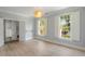 Bright bedroom with shuttered windows and a large closet with shelving at 3508 Henrietta Hartford Rd, Mount Pleasant, SC 29466