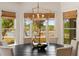 Dining room with water views and statement light fixture at 3508 Henrietta Hartford Rd, Mount Pleasant, SC 29466