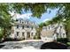Stately home featuring blue shutters, dormer windows, and a brick walkway to the front door and two-car garage at 3508 Henrietta Hartford Rd, Mount Pleasant, SC 29466