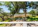 Outdoor fire pit and seating with serene view at 3508 Henrietta Hartford Rd, Mount Pleasant, SC 29466