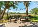 Fire pit with seating for outdoor entertainment on lush lot at 3508 Henrietta Hartford Rd, Mount Pleasant, SC 29466