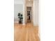 Hallway with hardwood floors, and view into a closet at 3508 Henrietta Hartford Rd, Mount Pleasant, SC 29466