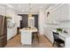 Well-appointed kitchen with island, marble countertops and stainless appliances at 3508 Henrietta Hartford Rd, Mount Pleasant, SC 29466