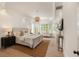 Spacious main bedroom with large windows, sitting area, and tray ceilings at 3508 Henrietta Hartford Rd, Mount Pleasant, SC 29466