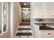 Mudroom with cubbies and stairs to the laundry room at 3508 Henrietta Hartford Rd, Mount Pleasant, SC 29466
