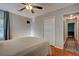 Comfortable bedroom with a ceiling fan, closet and hardwood floors at 359 Muirfield Pkwy, Charleston, SC 29414