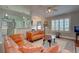 Open living room featuring bright colors, a ceiling fan, and a view of the kitchen at 359 Muirfield Pkwy, Charleston, SC 29414