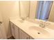 Bathroom featuring double sinks, and white cabinets at 413 Mistflower Ln, Moncks Corner, SC 29461