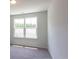 Bedroom with a window that offers outdoor views at 413 Mistflower Ln, Moncks Corner, SC 29461