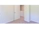 Bedroom featuring a doorway to another room and plush carpeting at 413 Mistflower Ln, Moncks Corner, SC 29461