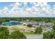 An aerial view shows community amenities including a playground, parking, recreation fields, and common gathering space at 4631 Scout Aly, North Charleston, SC 29405