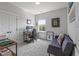 This bedroom is a flexible space, perfect for work or rest, featuring a desk and couch at 4631 Scout Aly, North Charleston, SC 29405
