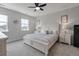 Cozy bedroom features neutral walls, plush carpet, white wood furniture, and natural lighting at 4631 Scout Aly, North Charleston, SC 29405