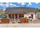 Restaurant exterior with outdoor dining and shade umbrellas at 4631 Scout Aly, North Charleston, SC 29405
