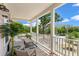Relaxing covered porch with comfortable seating, offering an inviting outdoor space at 4631 Scout Aly, North Charleston, SC 29405