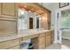 Bathroom featuring a vanity with mirror, cabinets, and lighting at 4702 Blockhouse Ln, Hollywood, SC 29449