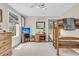 Bedroom with bunk beds and windows with beach themed curtains at 4702 Blockhouse Ln, Hollywood, SC 29449