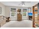 Bedroom with bunk beds, a rocking horse, and bright windows with beach-themed blinds at 4702 Blockhouse Ln, Hollywood, SC 29449