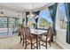 Charming breakfast nook with bay windows, bench seating, and a view of lush greenery at 4702 Blockhouse Ln, Hollywood, SC 29449