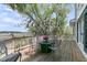 Outdoor deck with a table and chairs, with scenic views of the water and trees at 4702 Blockhouse Ln, Hollywood, SC 29449