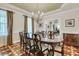 Dining room with chandelier lighting, decorative ceiling, and hardwood flooring at 4702 Blockhouse Ln, Hollywood, SC 29449