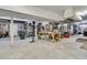 Spacious unfinished garage with plenty of room for parking and projects, featuring sturdy shelving and natural light at 4702 Blockhouse Ln, Hollywood, SC 29449