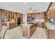 Spacious kitchen with wooden cabinets, granite countertops, and stainless steel appliances at 4702 Blockhouse Ln, Hollywood, SC 29449