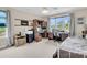 Bright office with a large window, desk, multiple monitors, printer, and adjacent bed at 4702 Blockhouse Ln, Hollywood, SC 29449