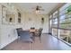 Cozy screened porch with comfortable seating, perfect for enjoying the outdoors at 4702 Blockhouse Ln, Hollywood, SC 29449