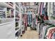 Spacious walk-in closet with custom shelving, shoe racks and ample storage space at 4702 Blockhouse Ln, Hollywood, SC 29449