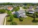 An aerial view of the property showcasing its backyard, screened porch, and surrounding neighborhood at 489 Dolphin Dr, Summerville, SC 29485