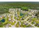 An aerial view of the community featuring lush green trees, ponds, and well-maintained homes at 489 Dolphin Dr, Summerville, SC 29485