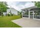 A view of the backyard with a screened porch at 489 Dolphin Dr, Summerville, SC 29485