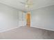 Bedroom with carpet floors, a ceiling fan, and a closet at 489 Dolphin Dr, Summerville, SC 29485