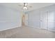 Bedroom with a ceiling fan and a door that leads to a hallway at 489 Dolphin Dr, Summerville, SC 29485