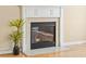 Elegant fireplace with marble surround and decorative mantel adds warmth to the home at 489 Dolphin Dr, Summerville, SC 29485
