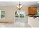 Bright kitchen area with sliding glass doors offering access to a screened-in porch at 489 Dolphin Dr, Summerville, SC 29485