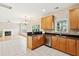 Spacious kitchen with open layout, tile flooring, and modern stainless steel appliances at 489 Dolphin Dr, Summerville, SC 29485