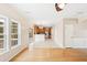Bright living space with views of kitchen featuring modern tile floors, and access to outdoor living at 489 Dolphin Dr, Summerville, SC 29485