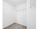 Empty walk-in closet offering shelving, rod, and carpeted floor at 489 Dolphin Dr, Summerville, SC 29485