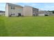 Spacious backyard with a lush green lawn and plenty of room for outdoor activities and entertaining at 5003 Ferry Field Dr, Summerville, SC 29485