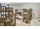 ' bedroom with wooden bunk beds and stairs offers a fun and functional sleep and play space at 5003 Ferry Field Dr, Summerville, SC 29485